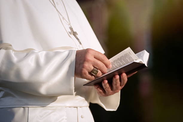 istock Pope reads the Bible 1310754869