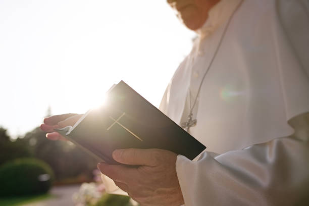 istock Pope reads the Bible 1310755428