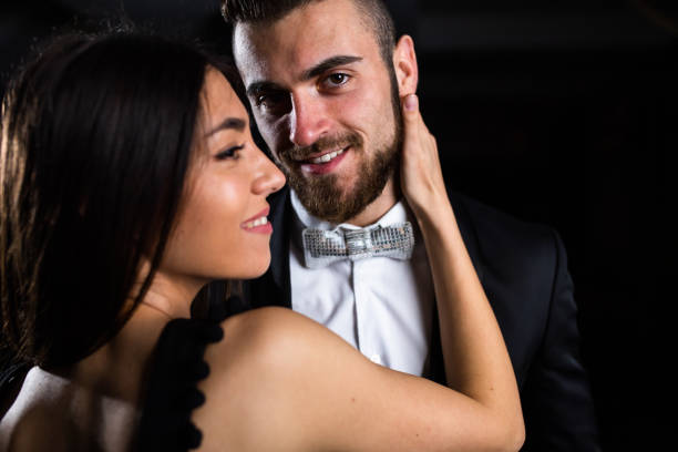 istock A happy couple dressed up in the dark 1310757040