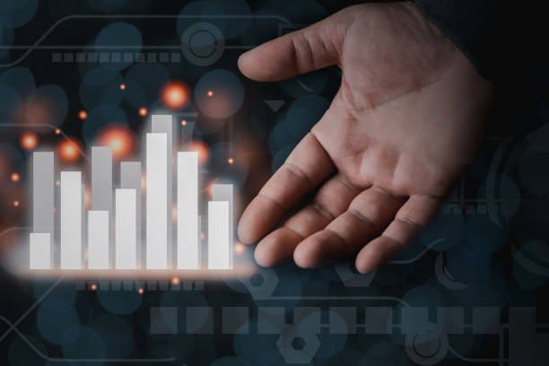 istock Businessman plan graph growth and increase chart positive indicators in his business with hand 1310758495