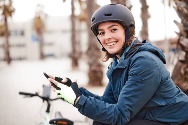 istock One female bicycle messenger looking at camera. 1310759165