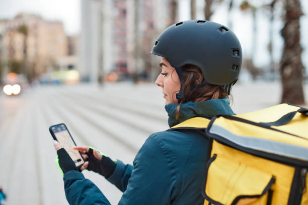 istock A female bicycle messenger in the city 1310759307
