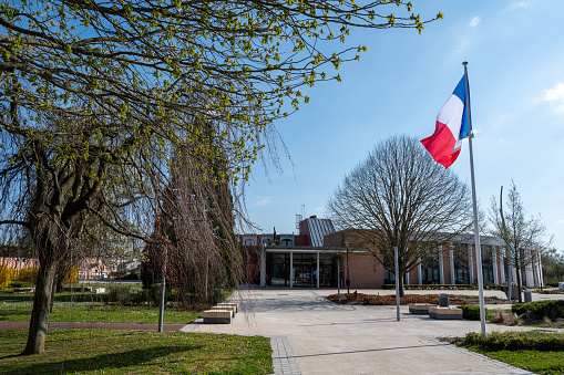Montigny-le-Bretonneux, France - April 03, 2021: Exterior view of the Montigny-le-Bretonneux town hall, in the Yvelines department, Ile-de-France region