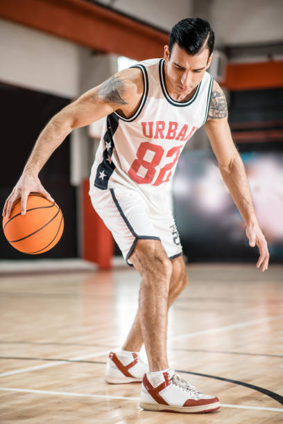 istock Sportsman having a workout before basket-ball game 1310761865