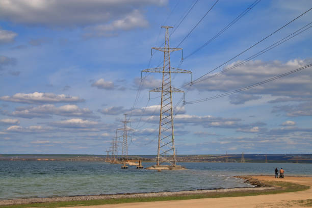 istock Power transmission towers installed in the estuary. 1310762306