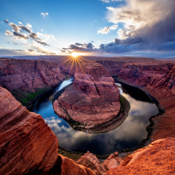 istock Horseshoe Bend in Arizona at sunset with sunburst 1310767039