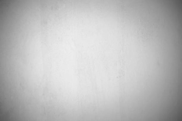 istock The concept using a program to blur the image of a white concrete wall. White grunge cement or painted concrete wall surface. Abstract slightly blurred cement wall background. 1310767149