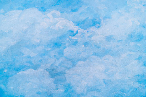 istock The watercolour background that blends in light blue, simple and creative. Paint with aqua blue shades on the cement wall. Watercolour illustrations on the concrete wall surface. 1310768839