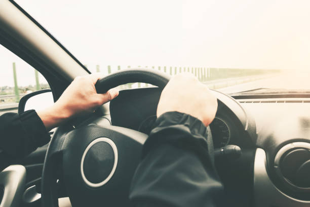 istock Driving a car on a highway 1310769064