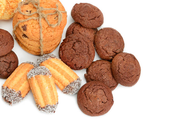 istock Different types of sweet cookies isolated on white background. 1310772215
