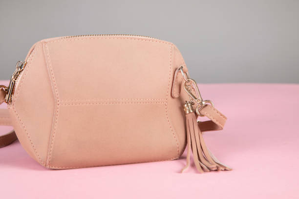 istock woman pink bag on table 1310773297