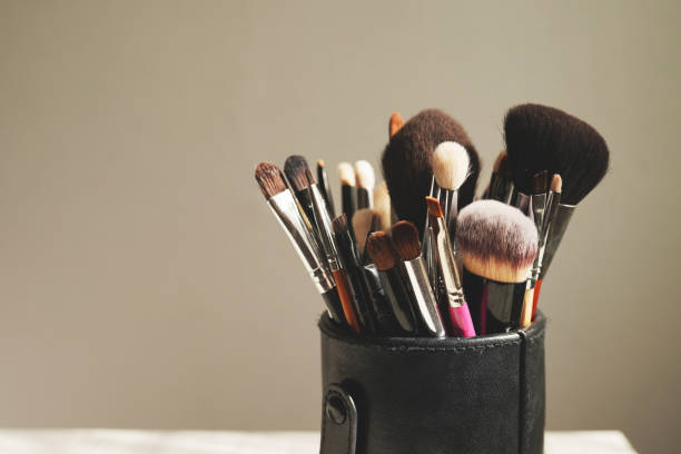 istock Professional visage brushes for face makeup on table. beauty salon 1310776700