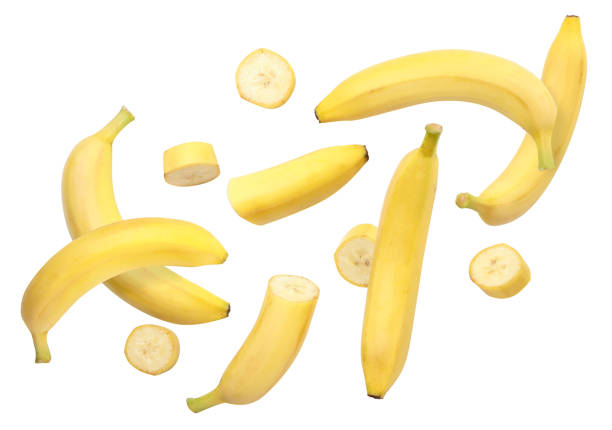 istock Whole bananas and slices are flying on a white background. Isolated 1310776943