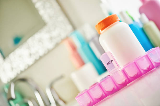 istock Vitamin bottles with personal care products in bright modern bathroom 1310777855