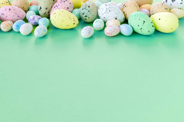 istock Beautiful Easter card with colorful eggs on paper green background. 1310779074