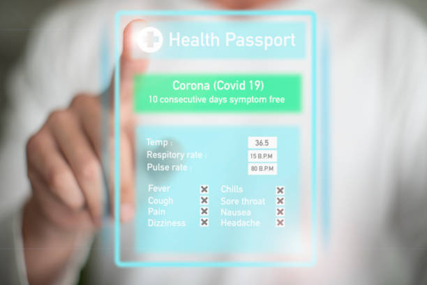 istock A Caucasian entering his symptoms on a digital vaccine passport.. 1310779653