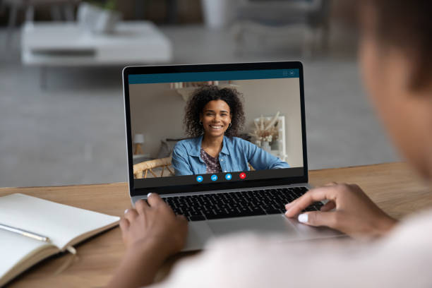 istock Biracial women talk on video call on laptop 1310784938