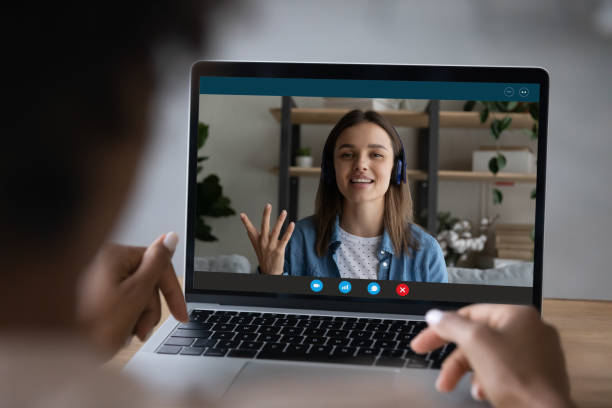 istock Female employee talk on webcam call with colleague 1310784941