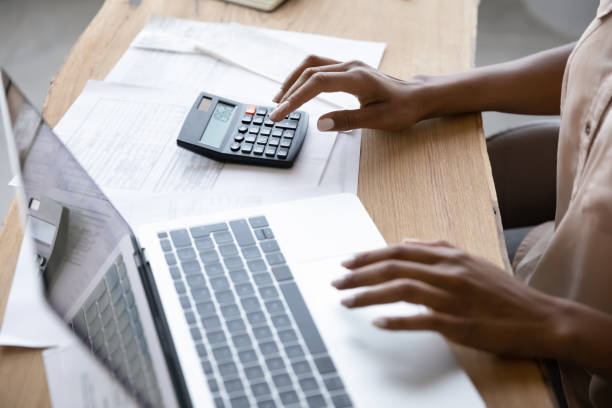 istock African American woman manage budget on computer 1310784950