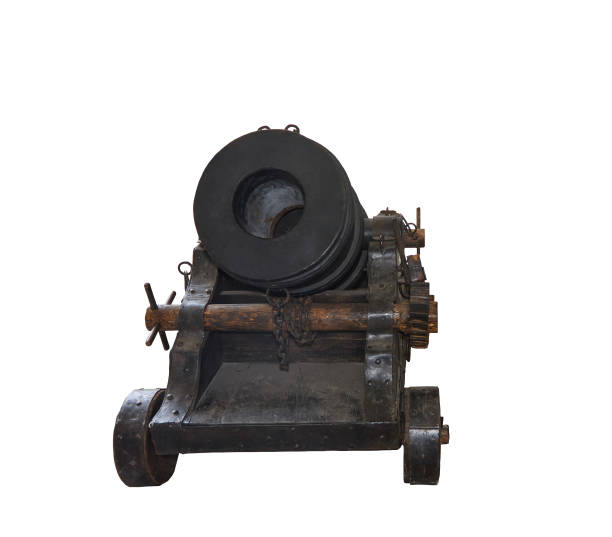 istock Ancient cannon on wheels isolated on white background with clipping path 1310785968