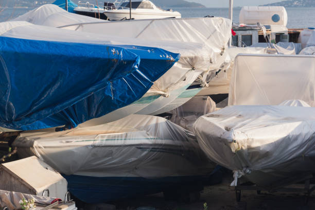 istock Sailboats covered with protective tarpaulin. 1310786125