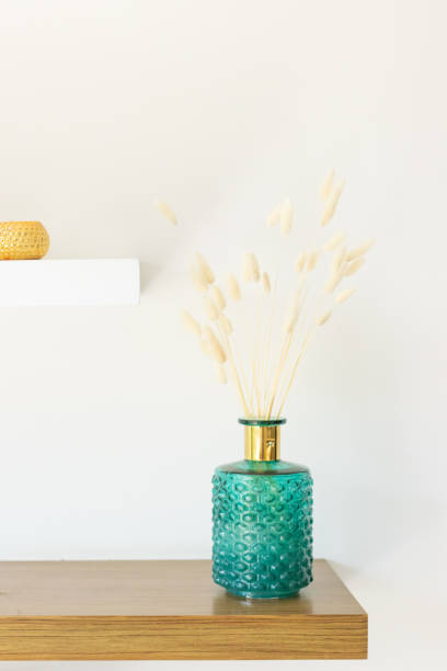 istock Spiky dried flowers inside glass vase 1310787160