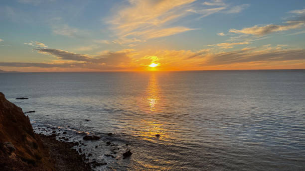 istock Sunset over pacific ocean in winter at Palos Verdes, CA 1310789555