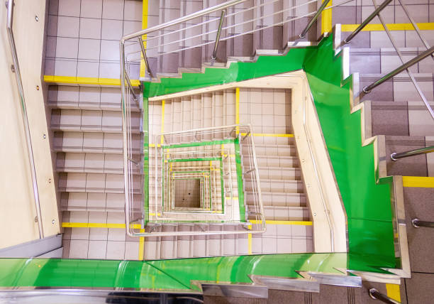 istock Building interior with green spiral staircase in Moscow 1310789839