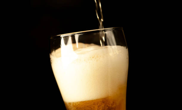 istock pour beer into a glass 1310790015