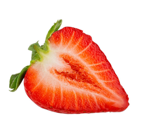 Halved strawberry isolated on white background with clipping path