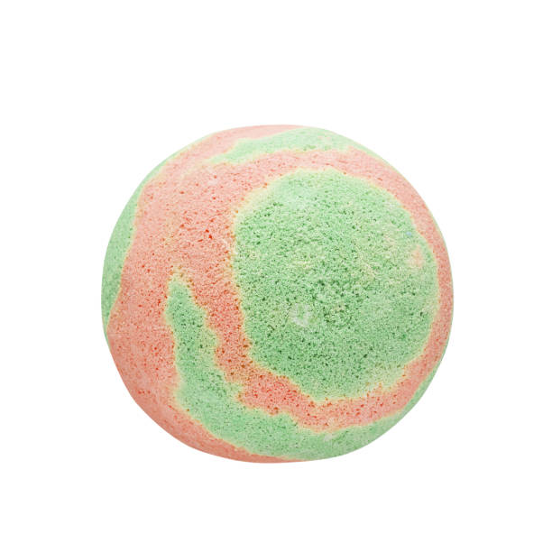 istock Single green-pink bath bomb, isolated on the white background with clipping path 1310793731