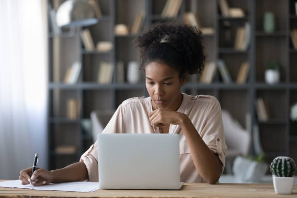 istock African American woman use computer working online 1310793861