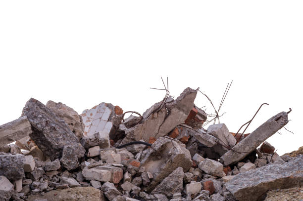 istock Concrete fragments of a destroyed building isolated on a white background. 1310797018