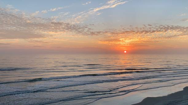 istock Sunrise by the Sea 1310798673