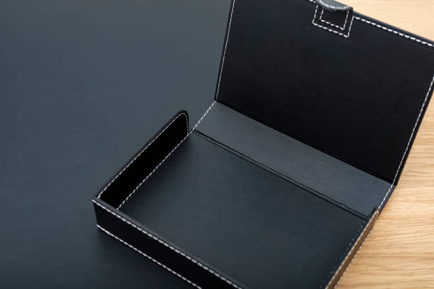 istock Empty black leatherette document box on the desktop in the office 1310803394