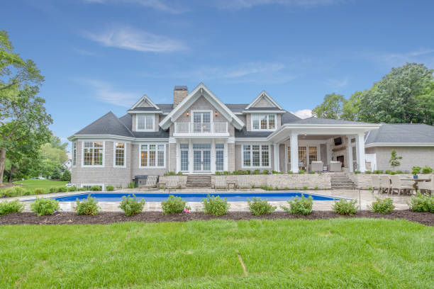 istock Lakeside home with pool in the rear 1310803451