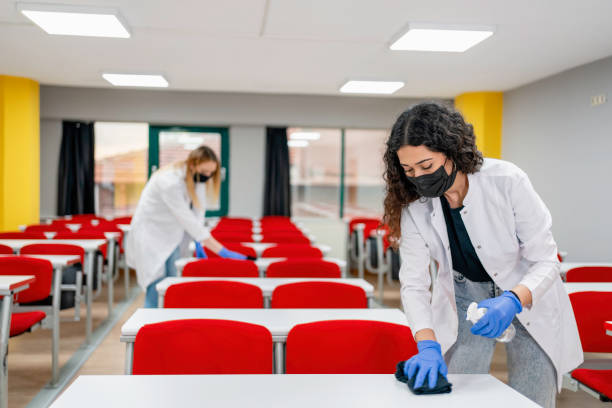 istock Teachers Cleaning Classroom during COVID-19 1310805636