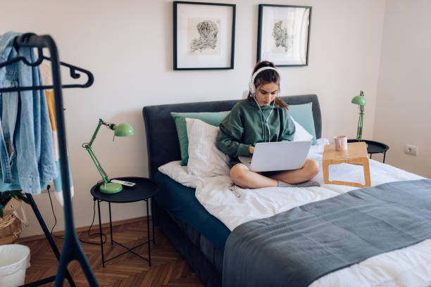 istock Girl learning online at her bedroom 1310808896