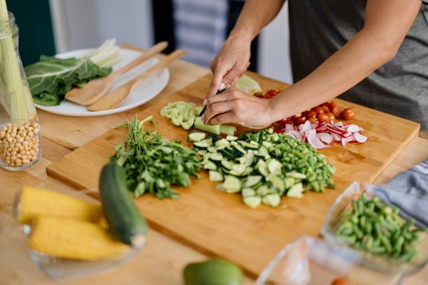 istock Fresh organic vegetables chopped on a chopping board 1310811724