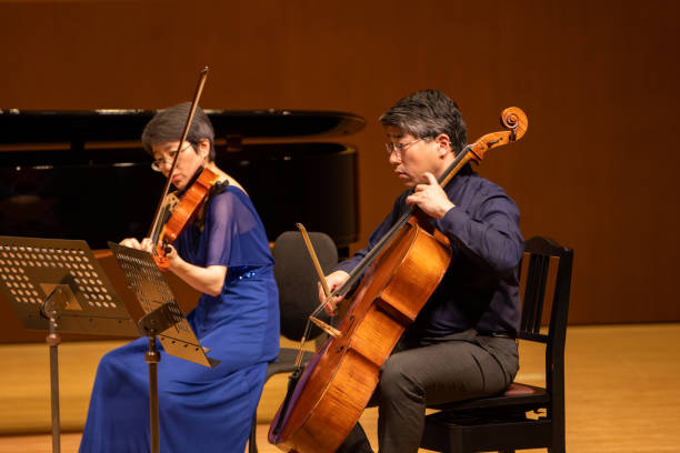 istock Musicians playing viola and cello at classical music concert 1310813897