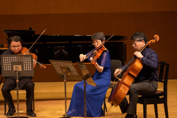 istock Musicians playing viola and cello at classical music concert 1310813901