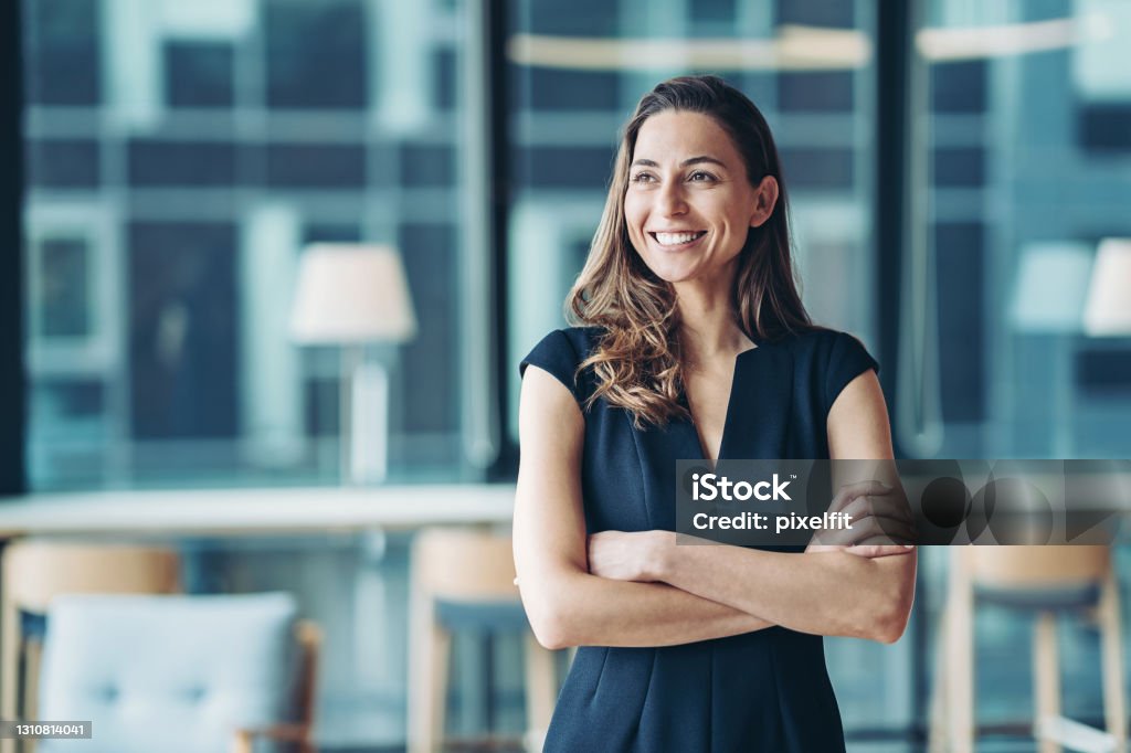 Portrait of a businesswoman standing in a a modern office Portrait of a businesswoman standing in the office Businesswoman Stock Photo