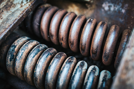 Old rusty corroded scrap metal parts.  Wrecking Machinery Parts.