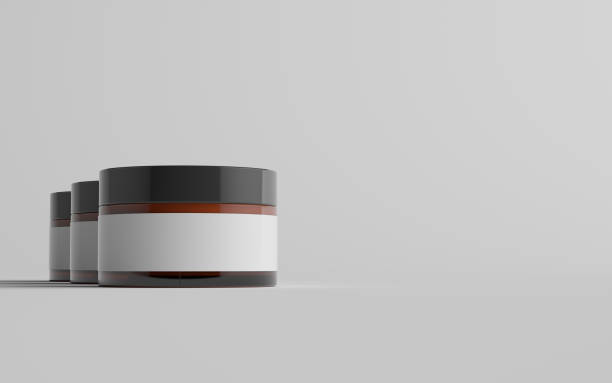 istock Amber Glass Cosmetic Jar Mockup - Three Jars. Blank Label 1310818962