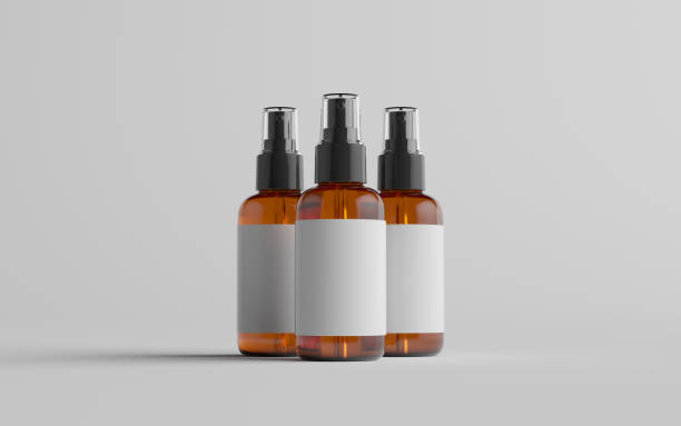 istock Amber Spray Bottle Mockup - Three Bottles. Blank Label 1310818968