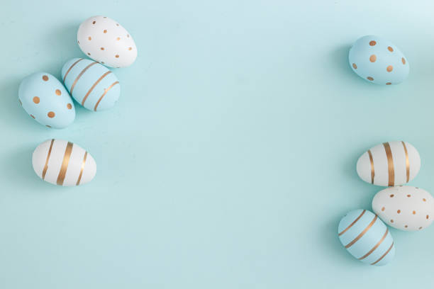 istock Easter russian cake and colorful eggs, flower on blue background. 1310823007