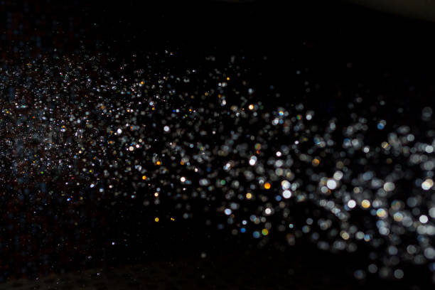 istock Black Bokeh Glittering stars of bokeh 1310830018