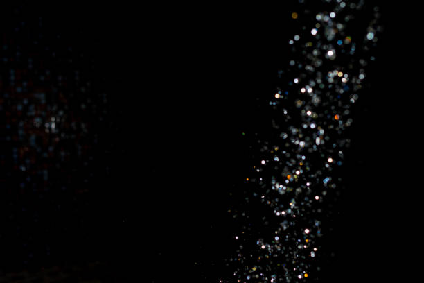 istock Black Bokeh Glittering stars of bokeh 1310830102