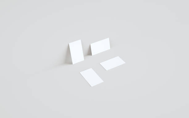 istock Business Card Mock-Up (3.5 x 2) Mock-Up - Two Cards Against Wall Background 1310830521