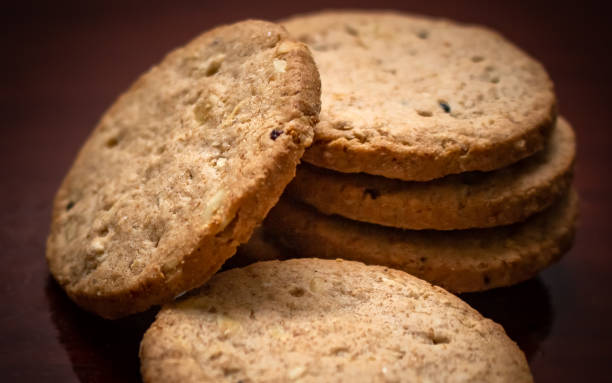 istock Wholegrain oatmeal cookie on wooden table with copy space. 1310833890